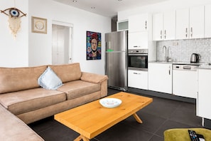 Appartement, uitzicht op tuin | Woonruimte