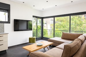 Apartment, Garden View | Living area - Bright Garden View Apt Near the Beach (Tel Aviv)