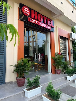 A hotel entrance with a sign reading 'ROYAL AANAN HOTEL.' - Hotel Royal Aana Inn (Jaipur)