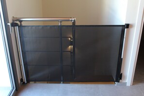 A room with a sliding glass door, a metal railing, and a tiled floor. - Zidros Apartments Maisonette Apartment 4 (Sfakaki)