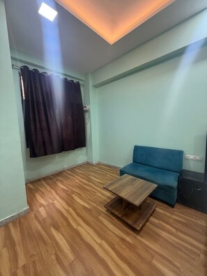 Deluxe Room, City View | Living area - A.V Grand Hotel (Kanpur)