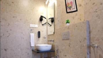 Shower, free toiletries, hair dryer, towels