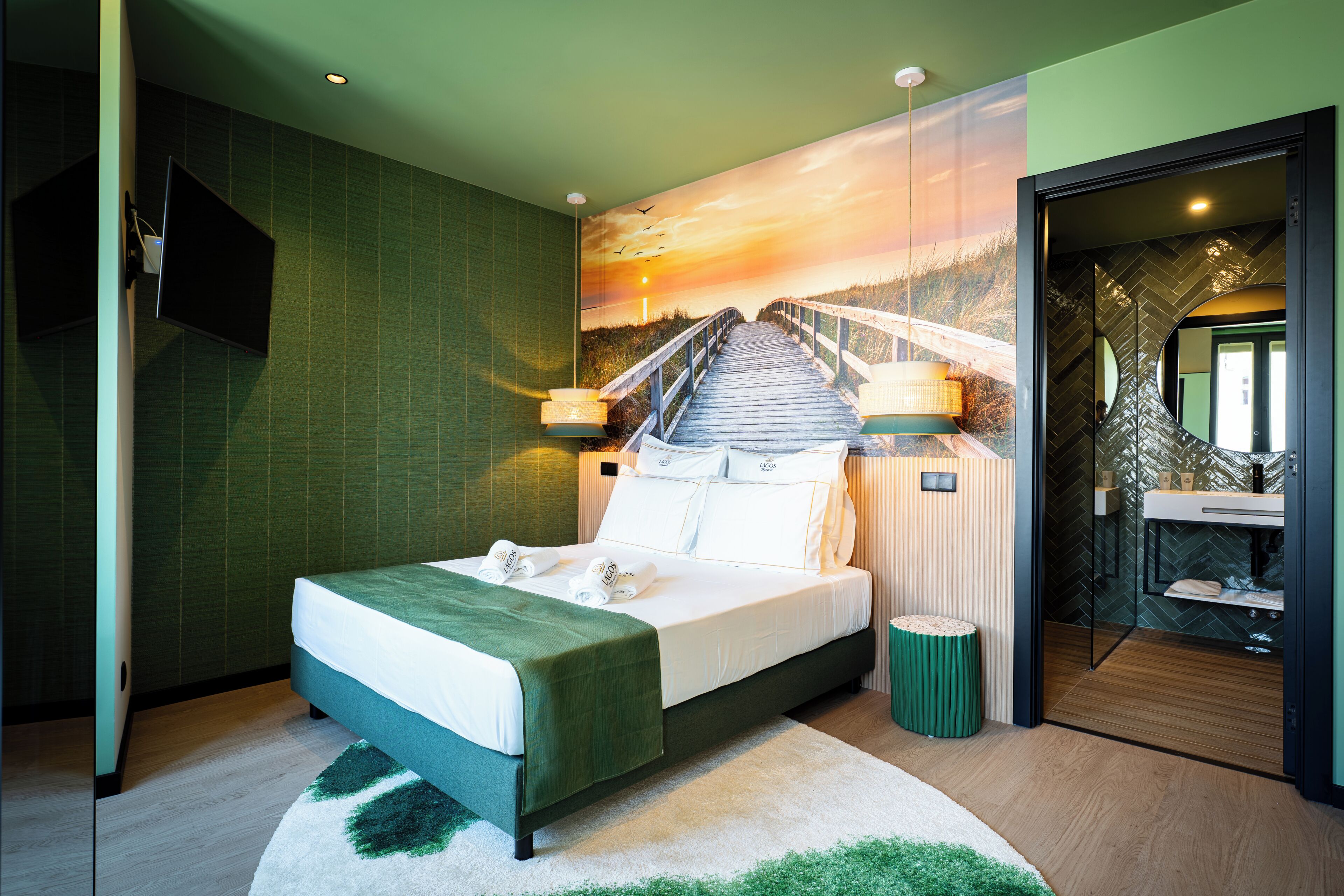 Premium bedding, pillow-top beds, desk, laptop workspace