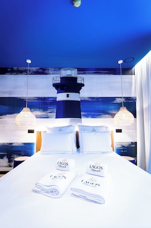 Premium bedding, pillow-top beds, desk, laptop workspace - Lagos Moments Lodge (Lagos)