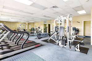 A gym with treadmills, weight machines, and exercise mats. - Oceanfront 2 Bed 2 Bath Condo with Pool! Braemar Towers 1804 (Ocean City)