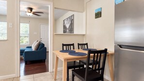 Cozy dining nook beside a bright, open living area with natural light - Pet-Friendly Home w/ Patio & Backyard (Houston)