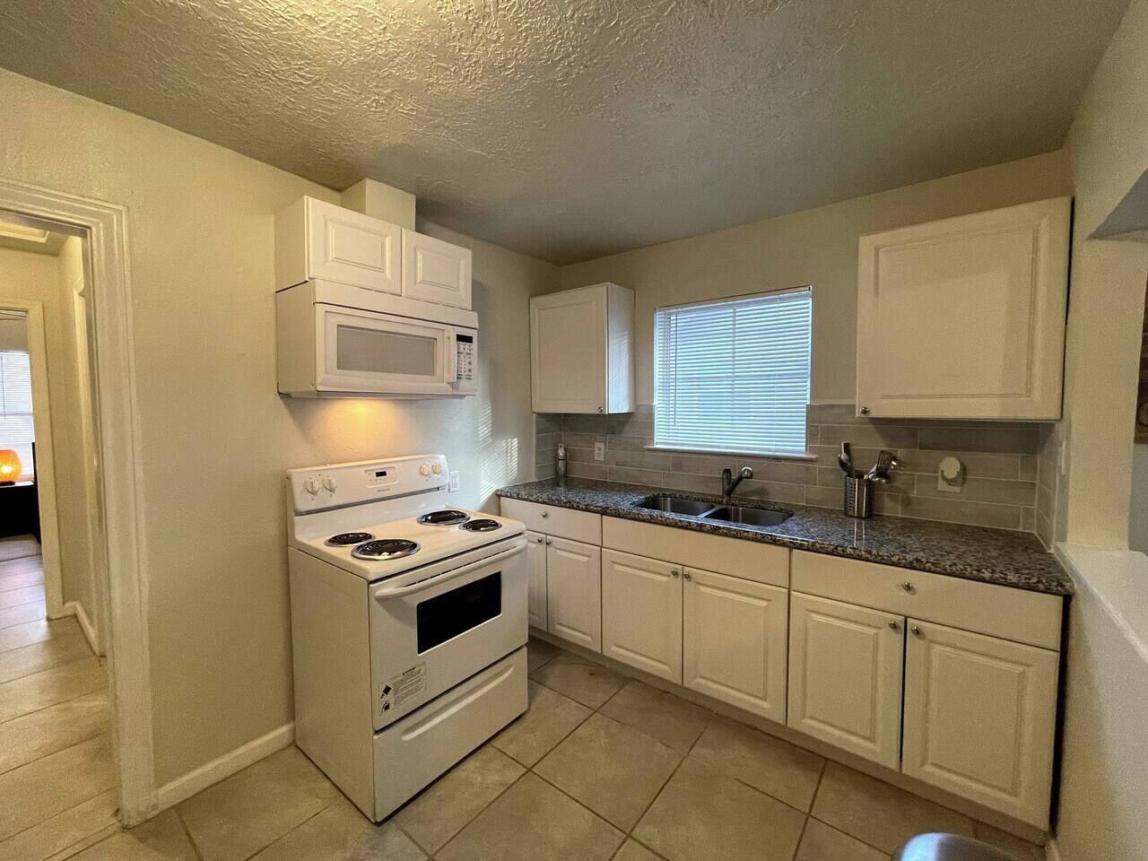Fridge, microwave, stovetop, cookware/dishes/utensils