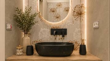 Suite, Non Smoking, Garden View | Bathroom | Shower, hair dryer, slippers, towels