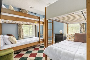 A bunk bed room with a checkered floor, a desk, and a ladder. - Perch&PineEscape, HotTub, Sauna, Firepit, Gameroom! (Basye)