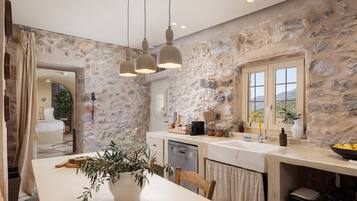 Signature Apartment, Patio, Sea View | Private kitchen | Espresso maker, coffee/tea maker, eco-friendly cleaning products