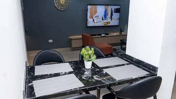 Family Apartment, Balcony, City View | Dining