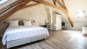 Deluxe Suite, 1 King Bed with Sofa bed, City View | Desk, laptop workspace, blackout drapes, iron/ironing board (on request)