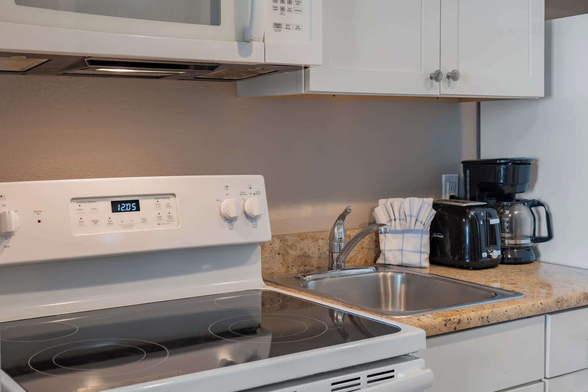 Coffee/tea maker, fridge, microwave, oven