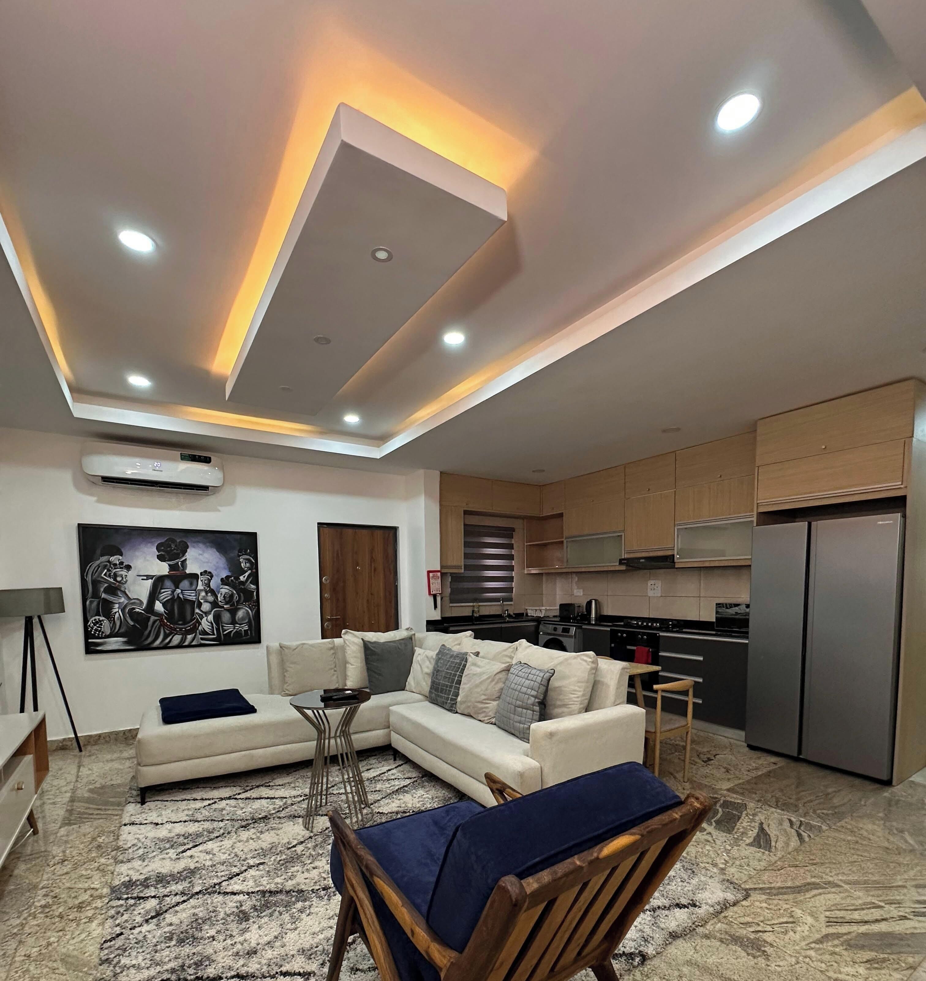 Departamento económico, balcón, vista a la ciudad | Área de sala de estar