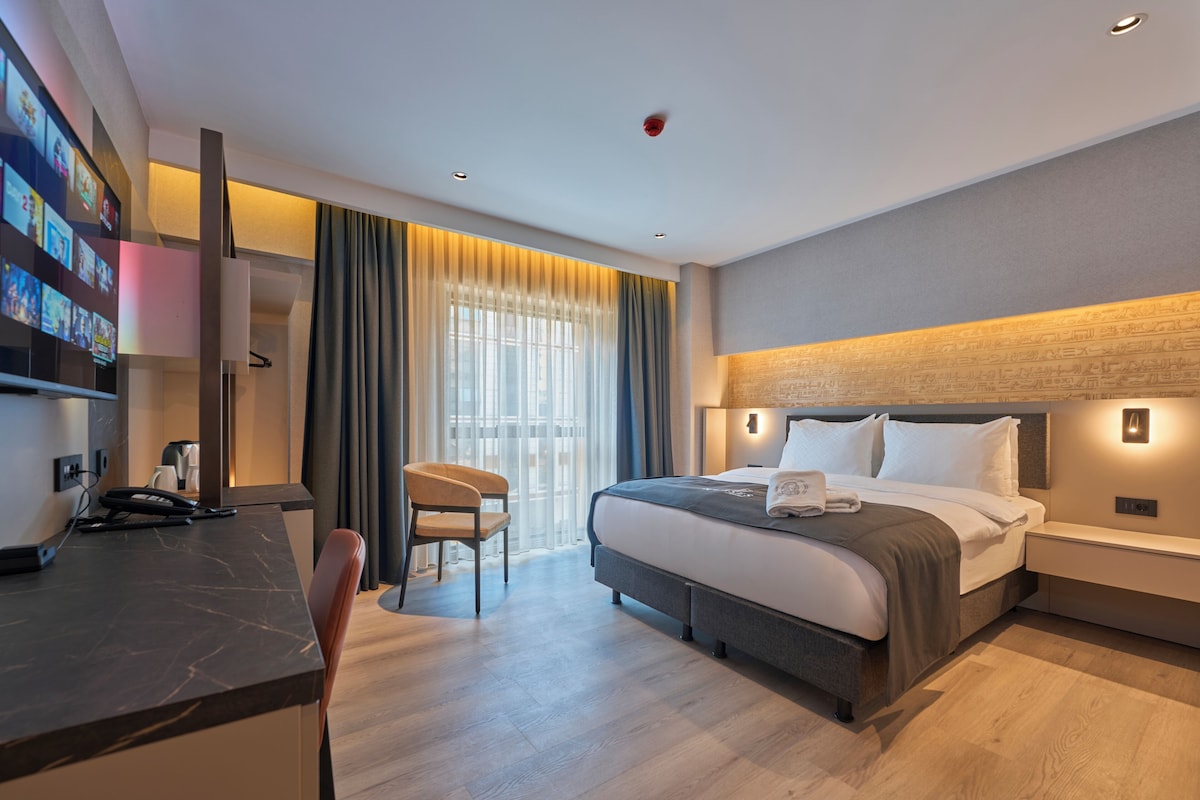 Habitación Deluxe doble, vistas a la ciudad | Colchones Select Comfort, minibar, caja fuerte