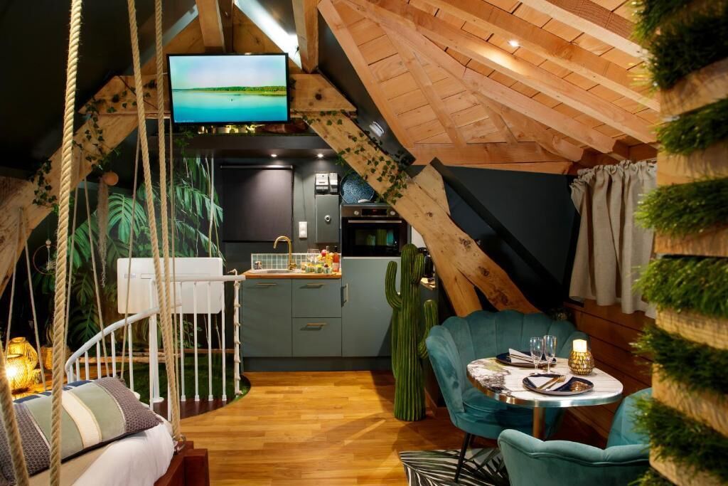 Suite Deluxe, hidromasaje | Área de sala de estar