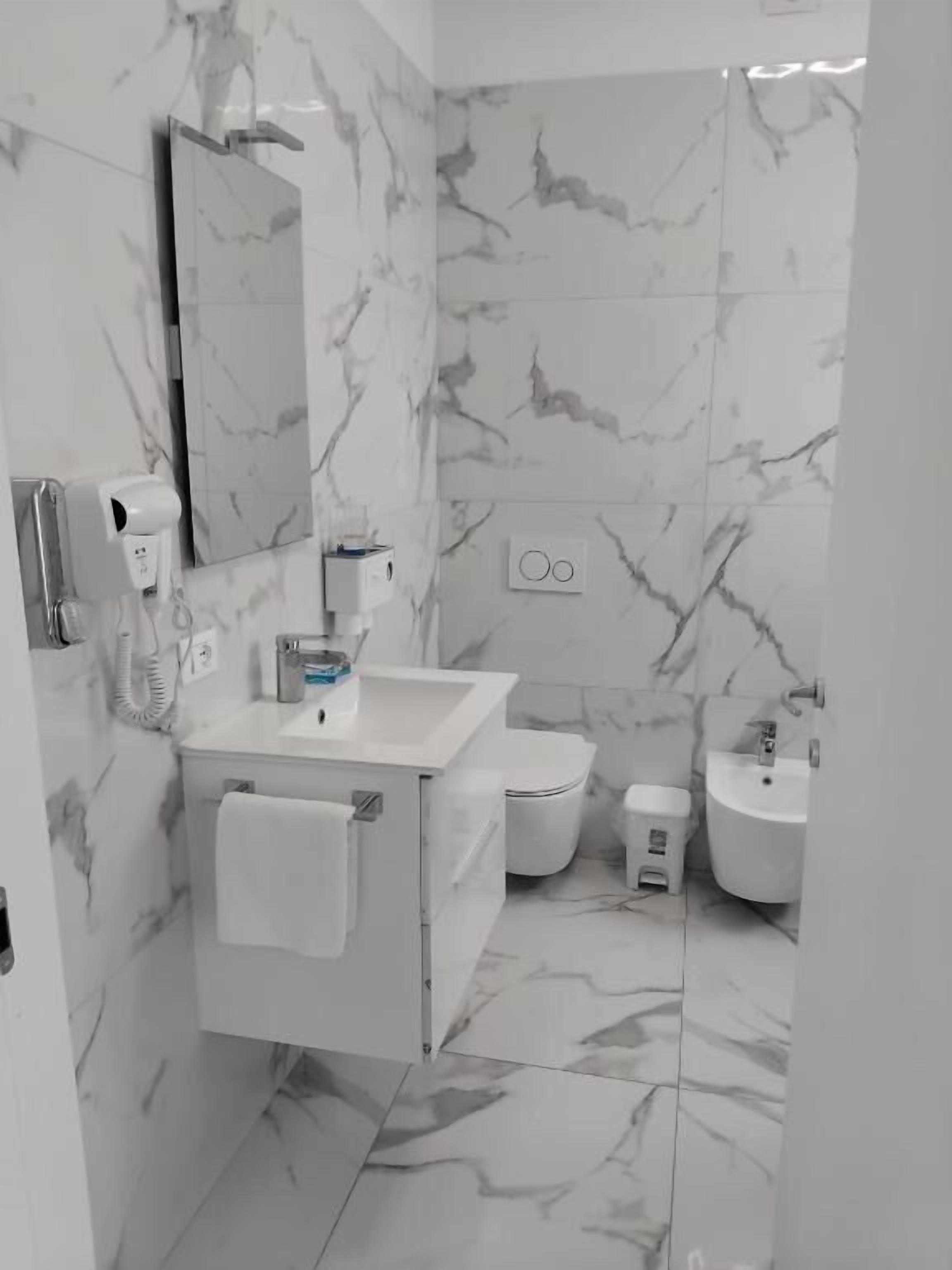Double Room, Garden View | Bathroom | Free toiletries, hair dryer, slippers, toilet paper