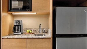 A kitchen with a microwave, coffee maker, sink, and a refrigerator. - 1 Bedroom Villa at Marriott Canyon Resort (Phoenix)