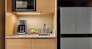 A kitchen with a microwave, coffee maker, sink, and a refrigerator. - 1 Bedroom Villa at Marriott Canyon Resort (Phoenix)