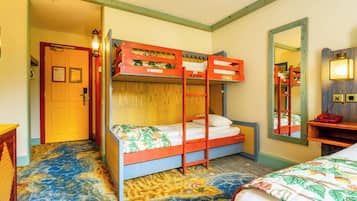 A room with bunk beds, a wooden door, a mirror, and a patterned carpet.