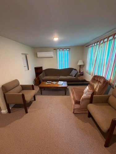 Cozy 2-bedroom cottage is situated directly on M-25, making it an ideal location