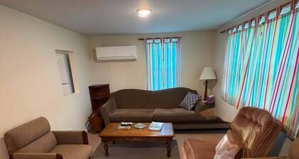 Cozy 2-bedroom cottage is situated directly on M-25, making it an ideal location
