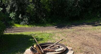 Cozy 2-bedroom cottage is situated directly on M-25, making it an ideal location