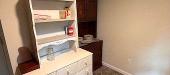 Cozy 2-bedroom cottage is situated directly on M-25, making it an ideal location