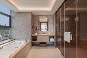 Suite Deluxe, 1 cama de matrimonio grande, vistas al mar | Baño