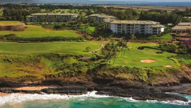 A coastal resort with multiple buildings, a golf course, and a rocky shoreline. - Luxury Ocean View Marriott's Kauai Lagoons - 2BR/2BA villa. Sleeps 6. (Lihue)