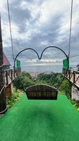 Bungalow, balcón, vistas al mar | Jardines del alojamiento