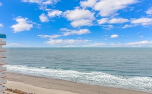 A beach with a clear sky and ocean. - Palace 1112 Ocean View Condo (Myrtle Beach)