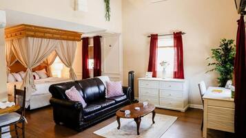 Deluxe Studio Suite, Non Smoking, Balcony | Living area | 39-inch Smart TV with digital channels, Hulu, streaming services