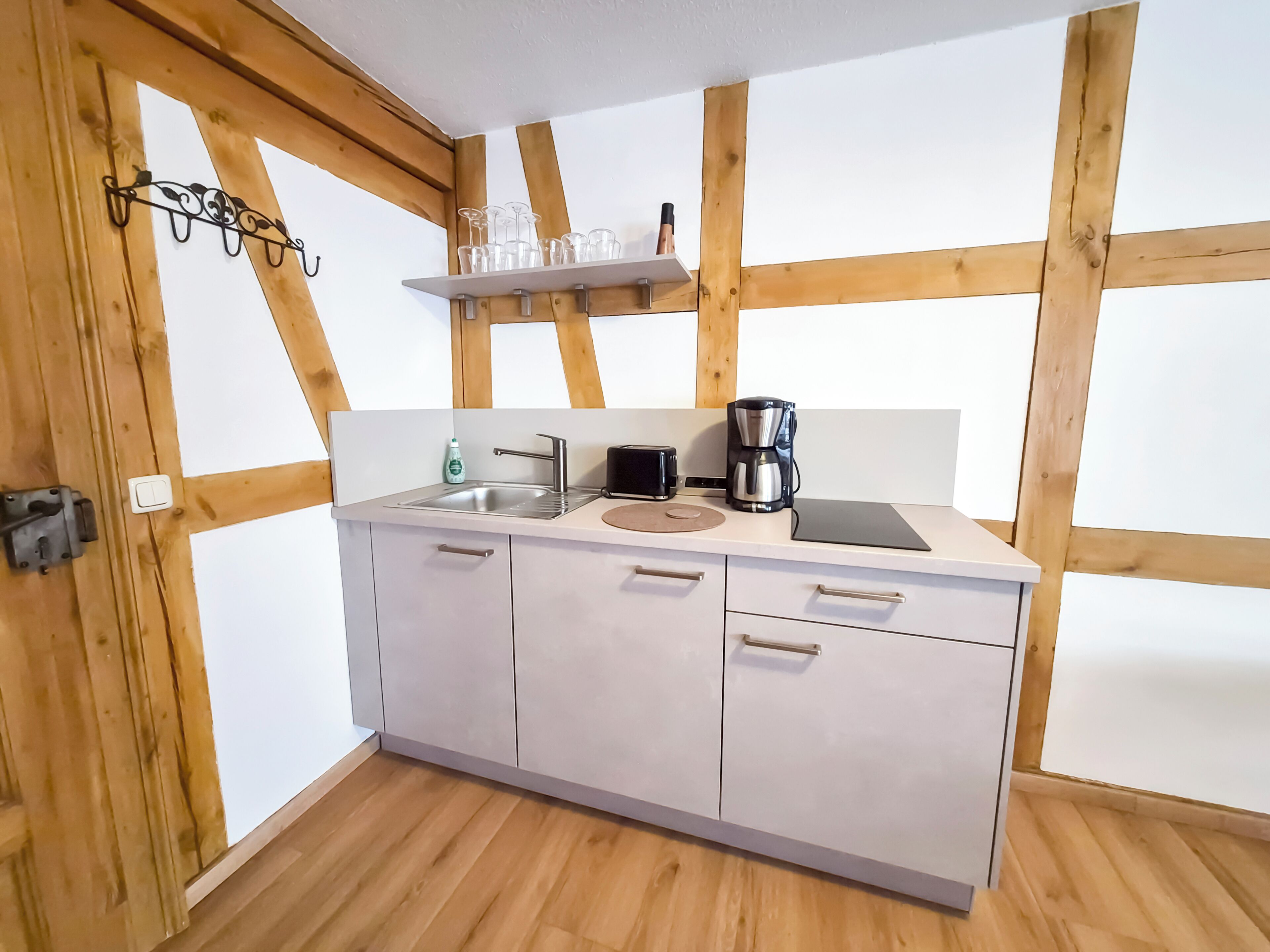 Coffee/tea maker, fridge, stovetop, toaster