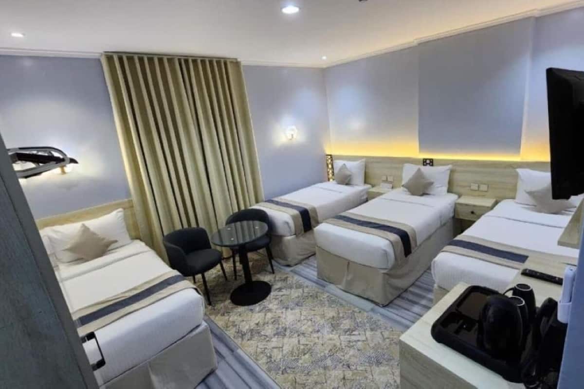 Deluxe Quadruple Room | Premium bedding, minibar, laptop workspace, free WiFi