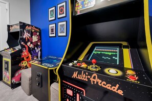 A multi-arcade gaming machine with a screen, joystick, and buttons. - Elegant Home near Disney with Resort & Waterpark Access - 1002JN (Kissimmee)