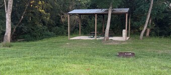Cozy 1-bedroom cabin in serene Foxworth with AC. Sleeps 16