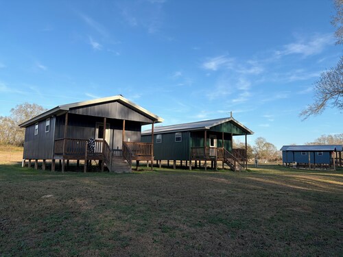 Cozy 1-bedroom cabin in serene Foxworth with AC. Sleeps 16