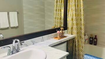Hair dryer, towels, soap, shampoo