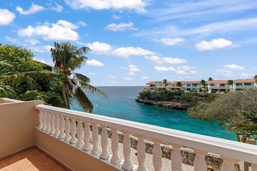 New! Oceanfront escape with stunning sea, bay and hillside views.
