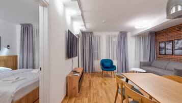 Family Apartment | Living area | 49-inch Smart TV with digital channels, heated floors
