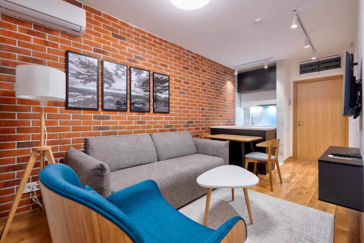 Junior Apartment | Living area | 49-inch Smart TV with digital channels, heated floors