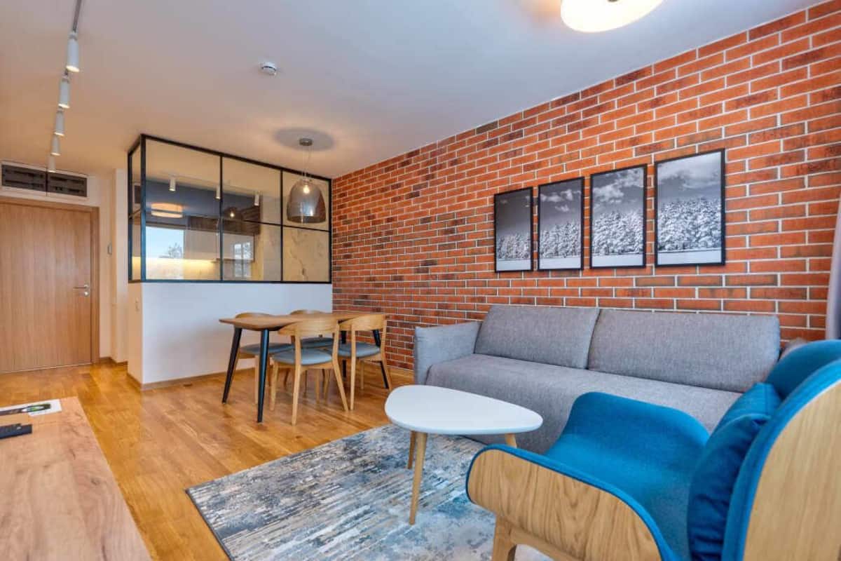 Comfort Apartment | Living area | 49-inch Smart TV with digital channels, heated floors