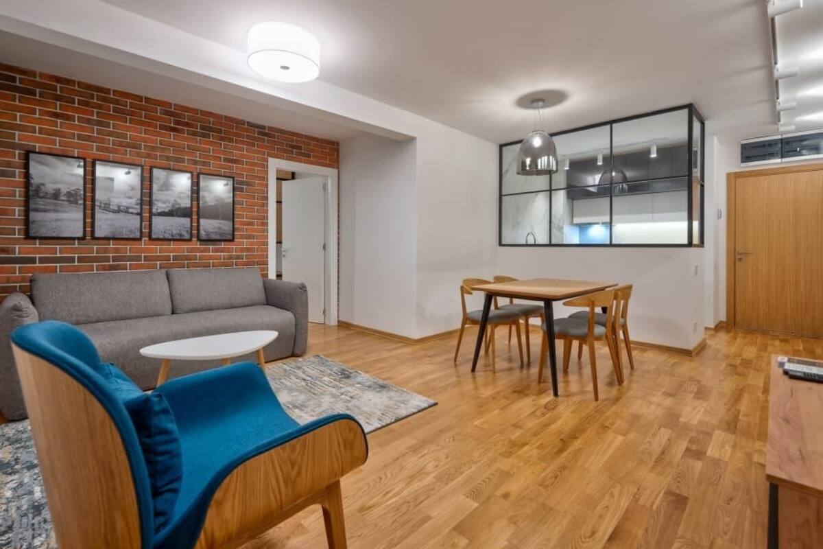 Family Apartment | Living area | 49-inch Smart TV with digital channels, heated floors
