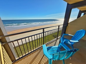 A balcony with a view of the beach and ocean. - NEW Amazing Ocean Front Retreat in Daytona Beach! (Daytona Beach Shores)