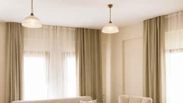 Familienapartment, Balkon, Stadtblick | Wohnbereich