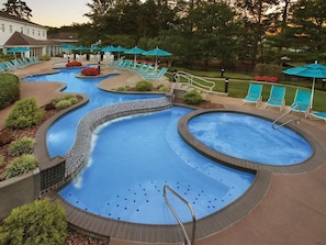 A pool area with multiple hot tubs and lounge chairs. - Marriott's Fairway in New Jersey 2 Bedroom Villas (Galloway)