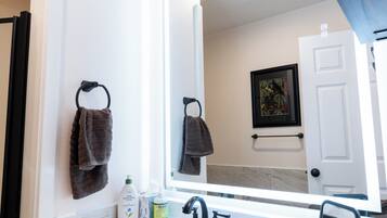 Shower, hair dryer, towels, soap