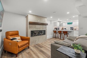 Living area - Blue Spruce Den Vernon - Stay Cozy. Play Wild. (Vernon)