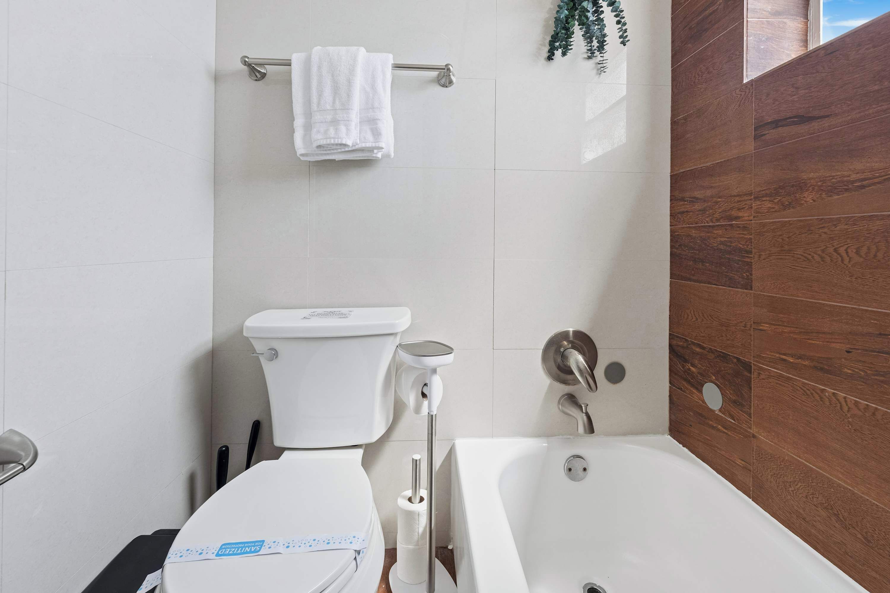 Shower, hair dryer, towels, shampoo